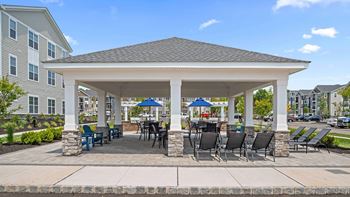 Covered outdoor pavilion with lounge
